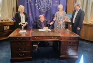 dst bill signing pen ceremony polis